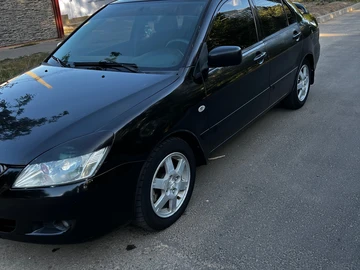 Авто Mitsubishi Lancer 2004 № 8135164
