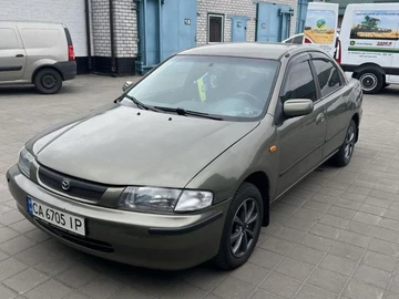 Авто Mazda 323 1998 № 8135624