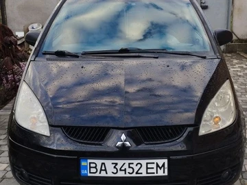 Авто Mitsubishi Colt 2006 № 8143149