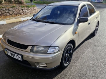 Авто Mazda 323 1997 № 8155149