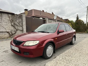 Авто Mazda 323 2002 № 8162649