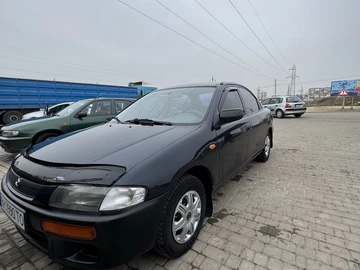 Авто Mazda 323 1997 № 8163491