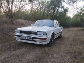 Авто Nissan Bluebird 1986 № 8171604