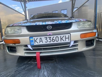 Авто Mazda 323 1996 № 8180635