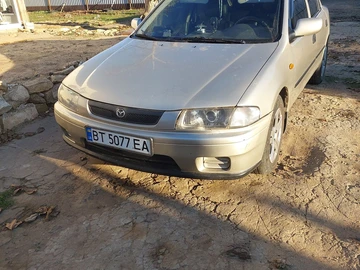 Авто Mazda 323 1998 № 8184237