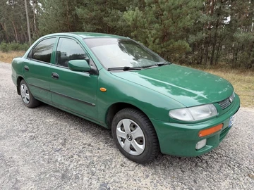 Авто Mazda 323 1997 № 8194457