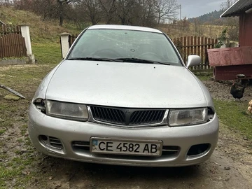 Авто Mitsubishi Carisma 1998 № 8201643