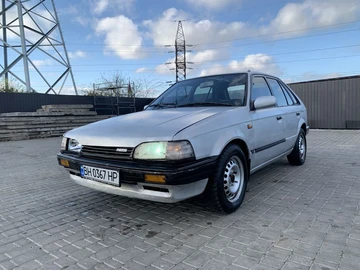 Авто Mazda 323 1989 № 8203035