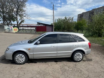 Авто Mazda 323 2003 № 8203996