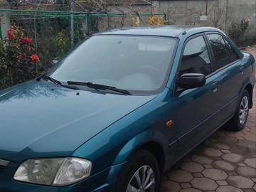 Авто Mazda 323 1999 № 8205006