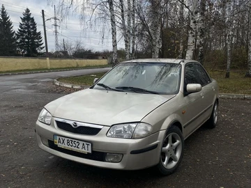 Авто Mazda 323 1999 № 8207744