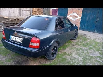 Авто Mazda 323 1999 № 8213458