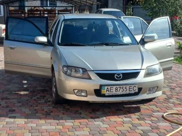 Авто Mazda 323 2002 № 8214018