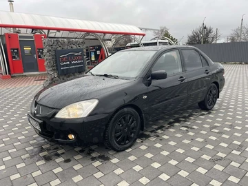 Авто Mitsubishi Lancer 2004 № 8215682