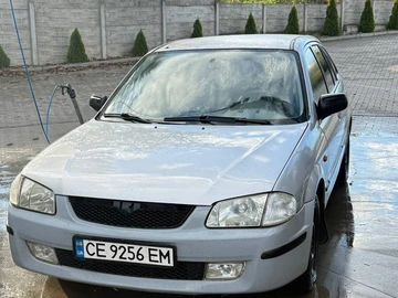 Авто Mazda 323 1998 № 8218401