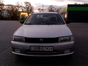 Авто Mazda 323 1998 № 8227513