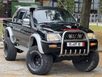 Авто Mitsubishi L 200 2004 № 8227632