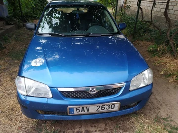 Авто Mazda 323 1999 № 8231248