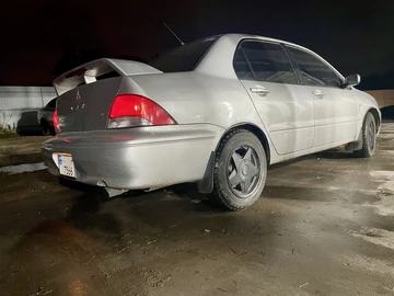 Авто Mitsubishi Lancer 2002 № 8236514