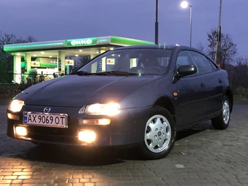 Авто Mazda 323 1998 № 8239084