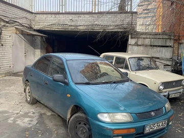 Авто Mazda 323 1997 № 8244573