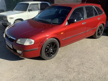 Авто Mazda 323 1999 № 8267493