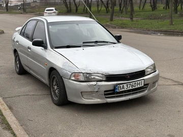 Авто Mitsubishi Lancer 1996 № 8268274