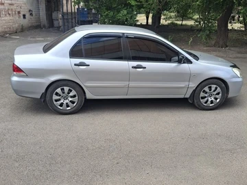 Авто Mitsubishi Lancer 2004 № 8269015