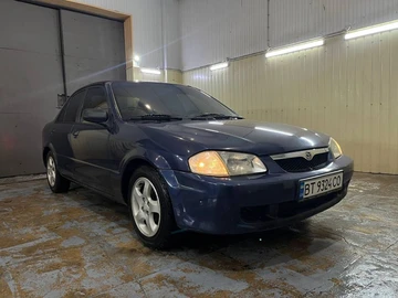 Авто Mazda 323 2000 № 8270191