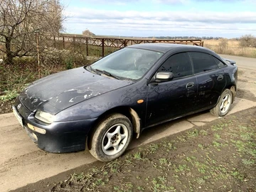 Авто Mazda 323 1998 № 8271623