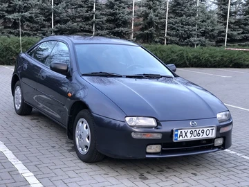 Авто Mazda 323 1998 № 8288693