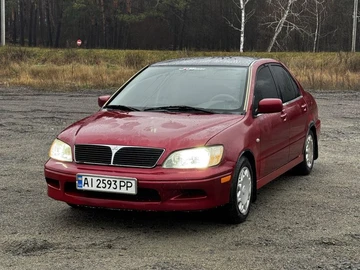 Авто Mitsubishi Lancer 2001 № 8295411