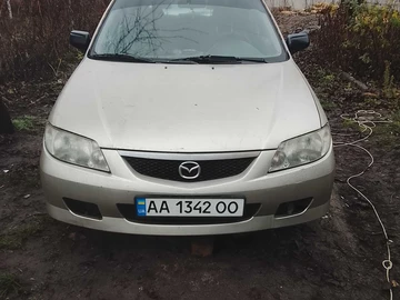 Авто Mazda 323 2002 № 8305644