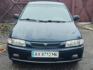 Авто Mazda 323 1997 № 8307376