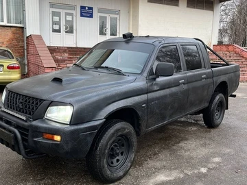 Авто Mitsubishi L 200 2004 № 8313034