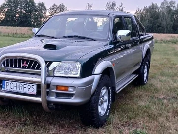 Авто Mitsubishi L 200 2004 № 8314424