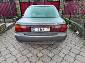 Авто Mazda 323 1996 № 8320263