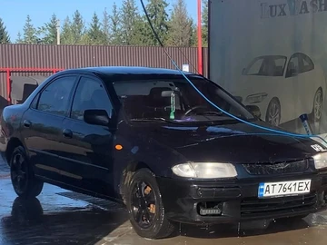 Авто Mazda 323 1996 № 8344798