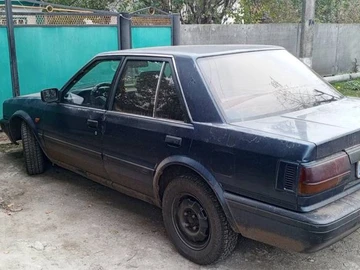 Авто Nissan Bluebird 1989 № 8349199