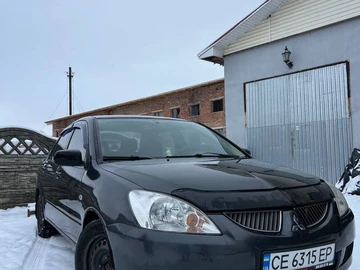 Авто Mitsubishi Lancer 2003 № 8354180