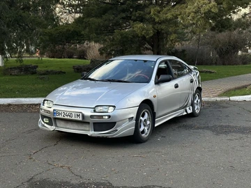 Авто Mazda 323 1996 № 8358065