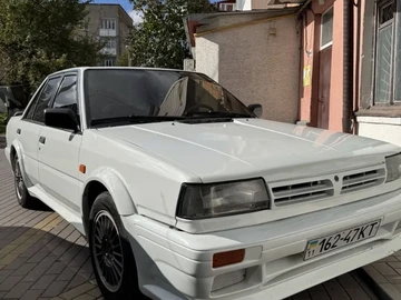 Авто Nissan Bluebird 1990 № 8362418