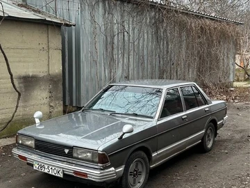 Авто Nissan Bluebird 1988 № 8376082