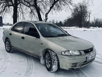 Авто Mazda 323 1997 № 8396608