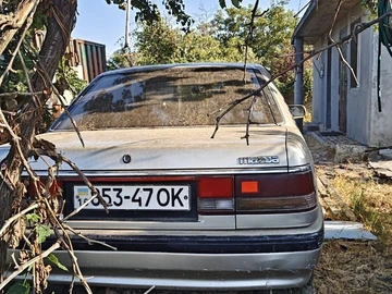 Авто Mazda Capella 1987 № 8404304