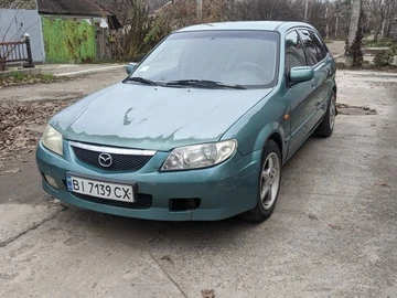 Авто Mazda 323 2001 № 8406663