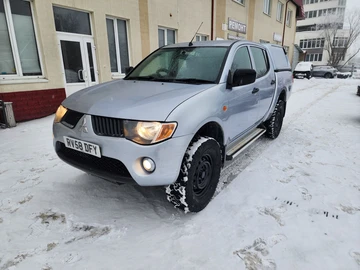 Авто Mitsubishi L 200 2009 № 8414975