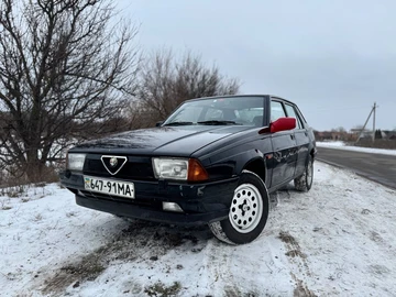 Авто Alfa Romeo 75 1991 № 8415060
