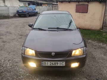 Авто Mazda 323 1999 № 8416202