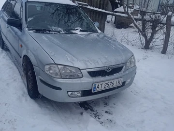 Авто Mazda 323 2000 № 8446193